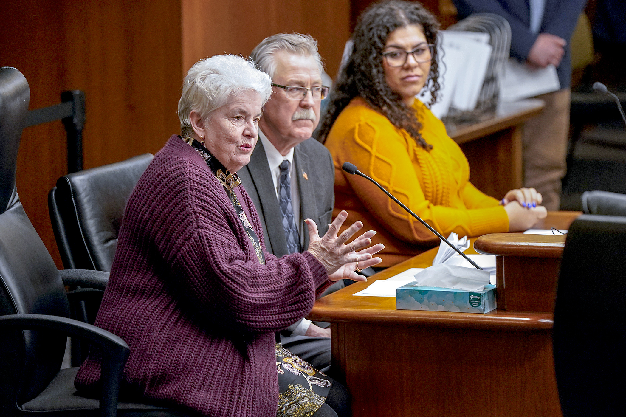 Ramsey County Commissioner Victoria Reinhardt testifies March 27 before the House Climate and Energy Finance and Policy Committee in support of HF4938. Also pictured are Washington County Commissioner Fran Miron and bill sponsor Rep. Athena Hollins. (Photo by Michele Jokinen)